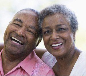 A happy elderly couple smiling