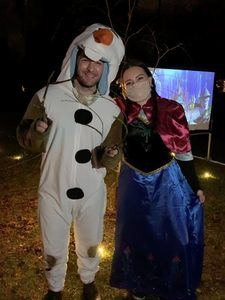 Two in Princess Anna and Olaf costumes from Frozen