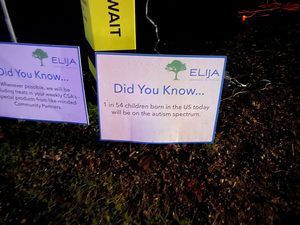 An ELIJA sign that says "did you know...1 in 54 children born in the U.S today will be on the autism spectrum