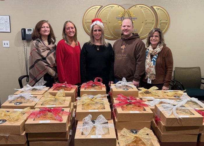 Melissa Negrin-Wiener, Esq., a senior partner at Cona Elder Law (center), stands with representatives from Family Service League and The Elijah Foundation at the 3rd Annual Pie Donation event. Photo courtesy of Cona Elder Law